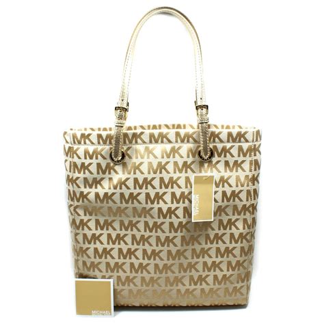 bolsas michael kors tote dorada|michael kors bolsa de hombro.